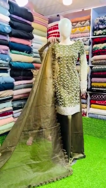 A green floral georgette silk dress with a dupatta is a stunning choice with Indian tradition