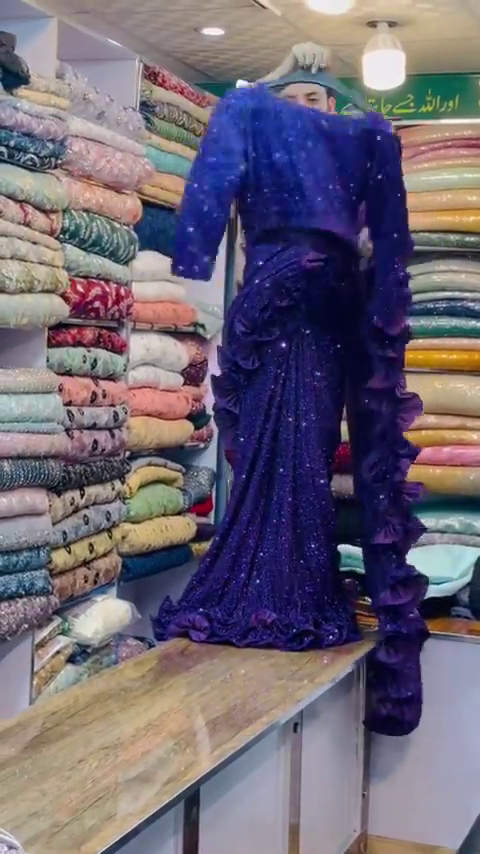 Purple Georgette designer Saree with all over seqwance work and blouse