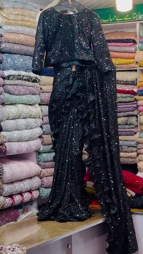 Black Georgette designer Saree with all over seqwance work and blouse