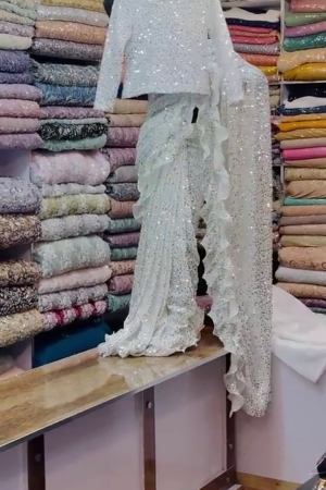 White Georgette designer Saree with all over seqwance work and blouse