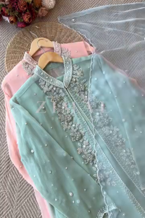 Exquisite Silk Suit Ensemble Featuring Intricate Mirror and Zari Embroidery, Paired with a Coordinated Dupatta – Ideal for Festive and Traditional Occasions