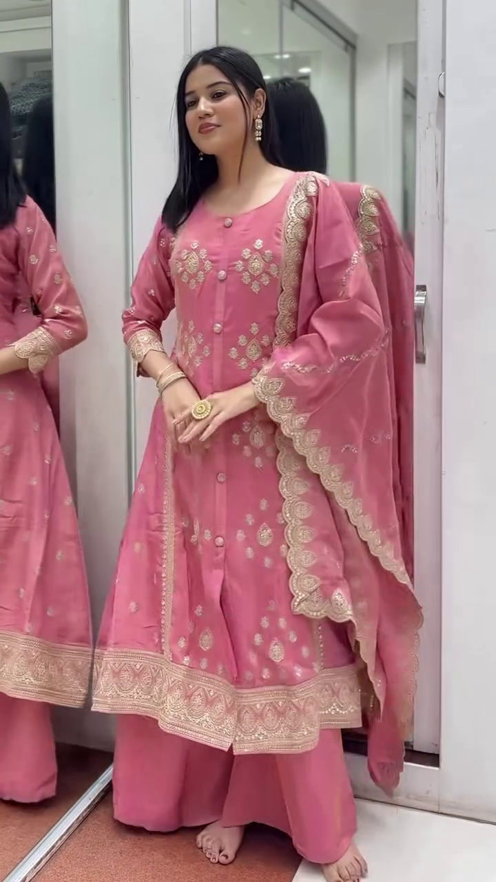 Buy new Pink Silk Anarkali Suit Featuring Intricate Zari Embroidery, Button Detailing, and Scalloped Lace Dupatta – Perfect for Weddings, Festive Celebrations, and Ethnic Gatherings