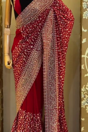 Regal Maroon Red Bridal Saree with Dense Hand Embroidered Zari, Sequins, and Thread Work in Floral and Paisley Motifs, Featuring an Intricately Detailed Heavy Border and Matching Blouse – Perfect for Traditional Weddings, Grand Celebrations, and Festive Occasions