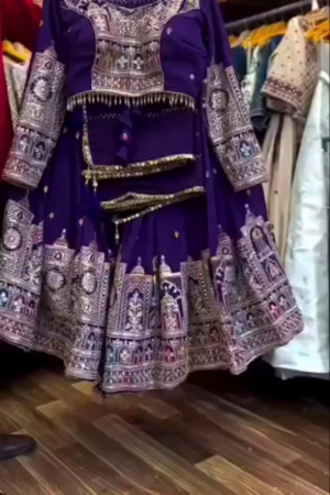 Royal Purple Traditional Indian Navratri Ghagra Choli with Intricate Silver Threadwork, Mirror Embellishments, Full Sleeve Embroidered Blouse, and Heritage-Inspired Temple Border Design