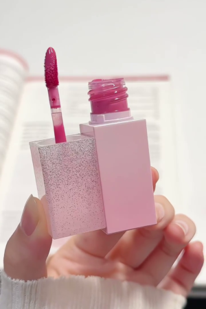 Hydrating Glossy Lip Tint with Velvet Smooth Finish – Long-Lasting, High-Pigment Formula in a Luxurious Sparkle-Glazed Pink Packaging – Moisturizing and Lightweight Lip Color