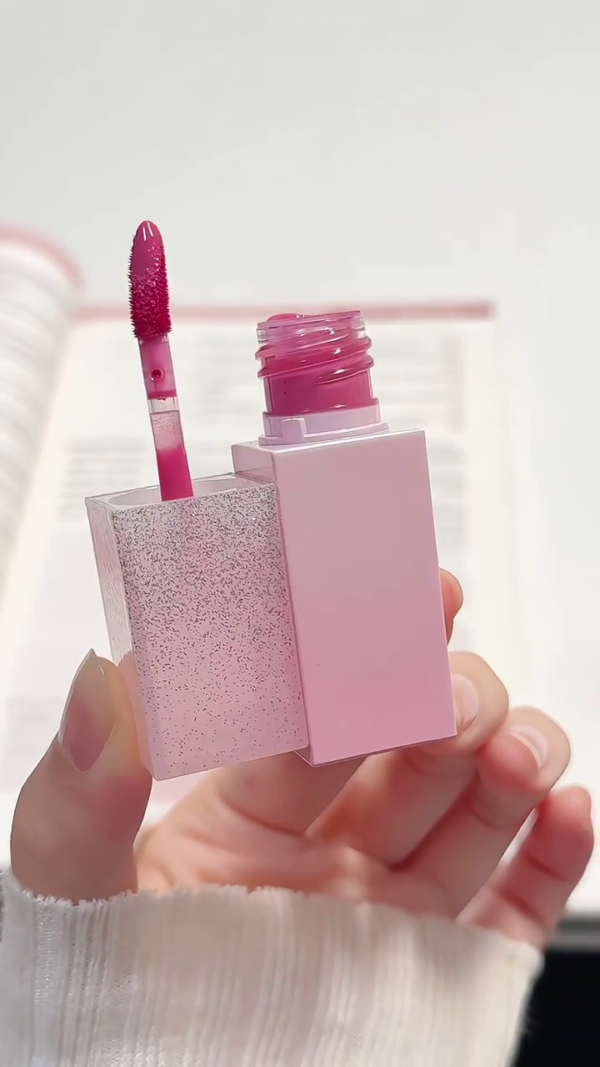 Hydrating Glossy Lip Tint with Velvet Smooth Finish – Long-Lasting, High-Pigment Formula in a Luxurious Sparkle-Glazed Pink Packaging – Moisturizing and Lightweight Lip Color