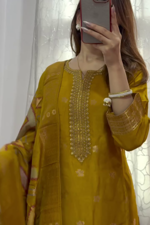Mustard Yellow Embroidered Silk Suit Set with Zari Work, Intricate Neck Detailing, Jacquard Dupatta, and Tasseled Straight Pants – Festive and Ethnic Wear for Women