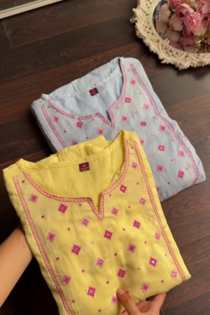 Soft Cotton A-Line Kurti Set with Intricate Pink Thread Embroidery and Mirror Work Detailing in Soothing Sky Blue and Vibrant Yellow Shades – Perfect for Festive and Everyday Ethnic Wear