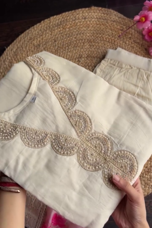 Off-White Ethnic Kurta Set with Golden Embroidery, Floral Dupatta, and Mirror Work – A Sophisticated Traditional Ensemble for Festive and Daytime Elegance